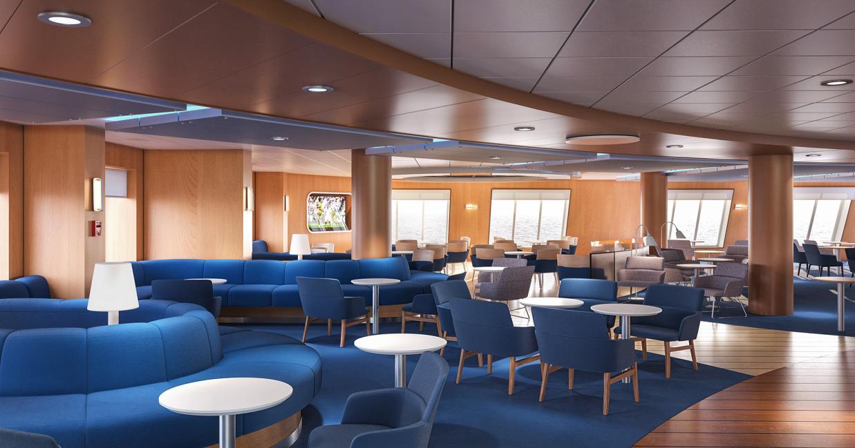 Ship lounge with curved seating, round tables, wood-paneled walls, and large windows overlooking the ocean